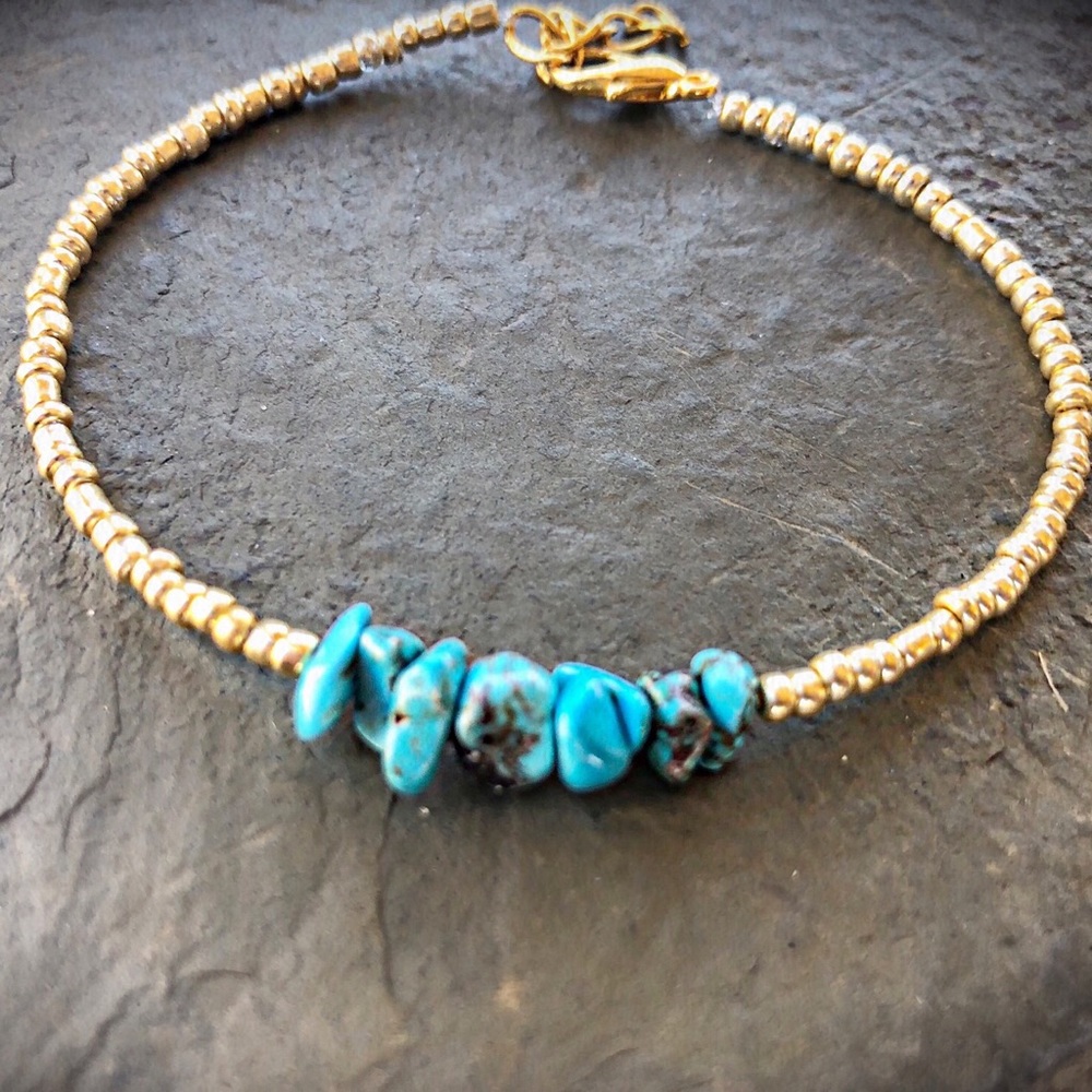Turquoise and gold beaded bracelet